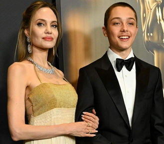 Angelina Jolie dhe djali i madh Knox  shfaqen me paraqitjen  e 
 jashtëzakonisht të rrallë në tapetin e kuq