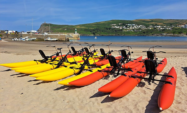 Aquabikes lined up on Port Erin beach Isle of Man