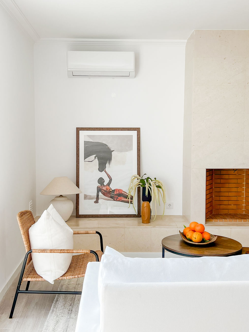 Spacious living room in Albufeira oceanfront property with stylish coastal decor and abundant natural light