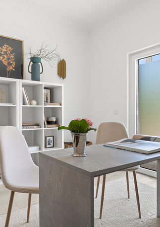 Home office in Alapraia Estoril, beautifully staged with coastal accents and modern furnishings for an inviting workspace
