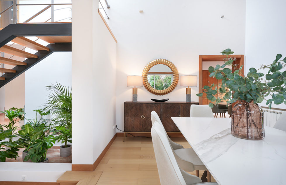 Dining room at Quinta da Pedra, Cascais, thoughtfully styled with a mix of vintage and contemporary pieces, providing an elegant space for fine dining and entertaining guests