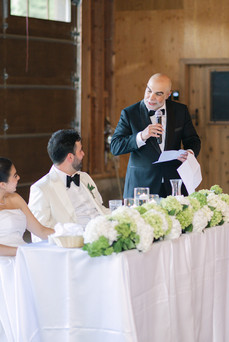 Montana wedding in Seeley Lake featuring a luxury weekend celebration with Camp Santana, a western welcome party, and an elegant lakeside ceremony with 200 guests.
