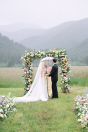 Destination wedding in Bozeman Montana featuring a pastel wildflower wedding and a couple building their life in Montana. Get inspiration and planning tips for your Bozeman wedding.
