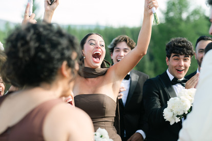 Montana wedding in Seeley Lake featuring a luxury weekend celebration with Camp Santana, a western welcome party, and an elegant lakeside ceremony with 200 guests.
