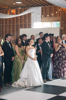 Montana wedding in Seeley Lake featuring a luxury weekend celebration with Camp Santana, a western welcome party, and an elegant lakeside ceremony with 200 guests.