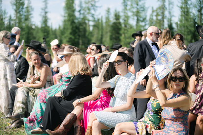 Montana wedding in Seeley Lake featuring a luxury weekend celebration with Camp Santana, a western welcome party, and an elegant lakeside ceremony with 200 guests.
