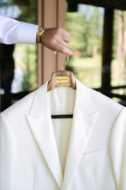 Montana wedding in Seeley Lake featuring a luxury weekend celebration with Camp Santana, a western welcome party, and an elegant lakeside ceremony with 200 guests.