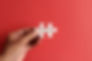 hand-holding-puzzle-pieces-with-text-solution-on-r-2023-11-27-04-51-02-utc.jpeg