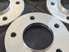 Lathed spacers for specialty fitment system