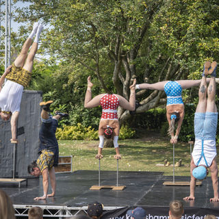 Group hand balancers, family entertainment, circus artistes, performers, performing, high skilled, circus show, interactive entertainment