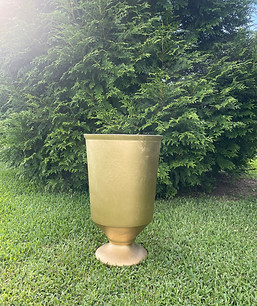 Gold pedestal urn for floral arrangements and event décor.