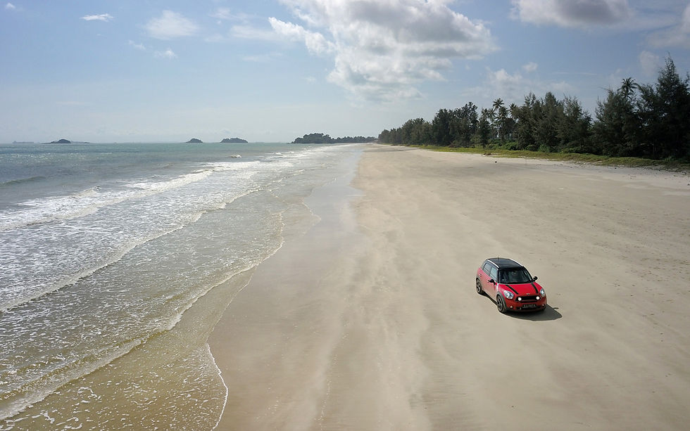 Wrapping up my coast to coast road trip on the white sandy beach of Desaru.