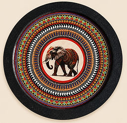 Path of the Sacred Giant: Circle of Ancestral Power is an elephant inspired 16-inch, hand-painted mandala in black, terracotta, rust, copper, turquoise, gold, ivory, and charcoal by Pheasant Tail Artistry.