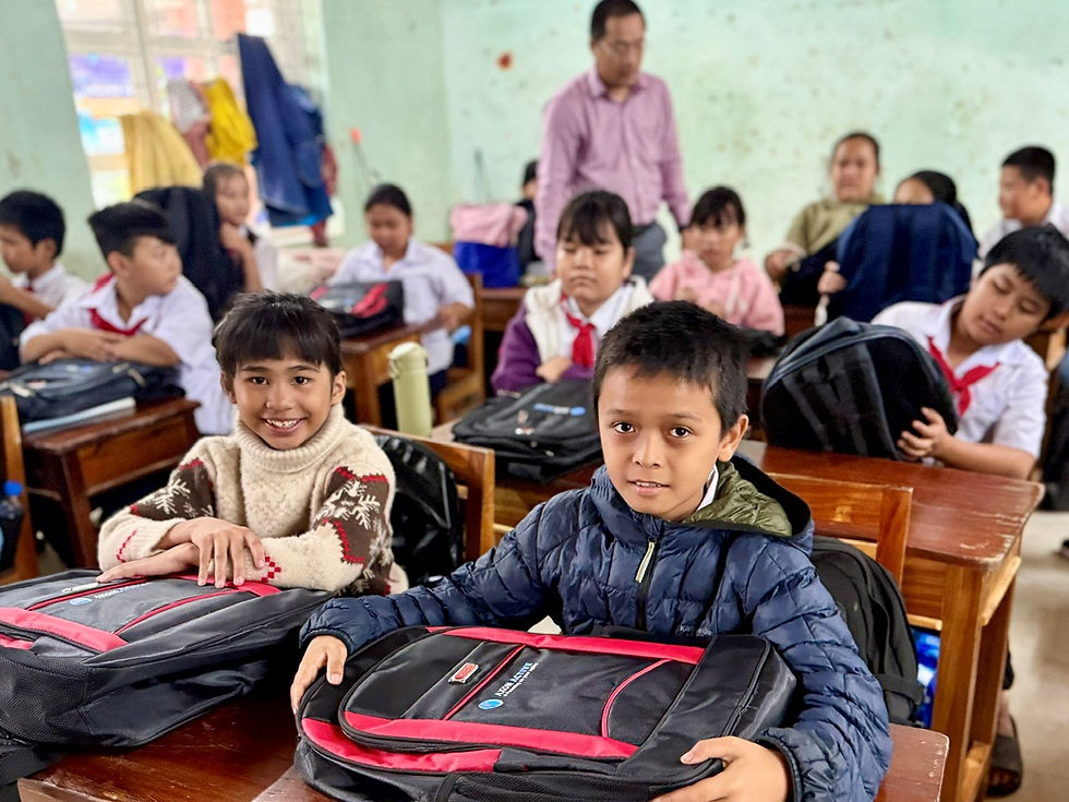 Happy faces of students as they received their study gifts.
