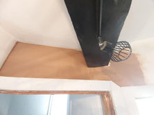 a light is hanging from the ceiling above a door