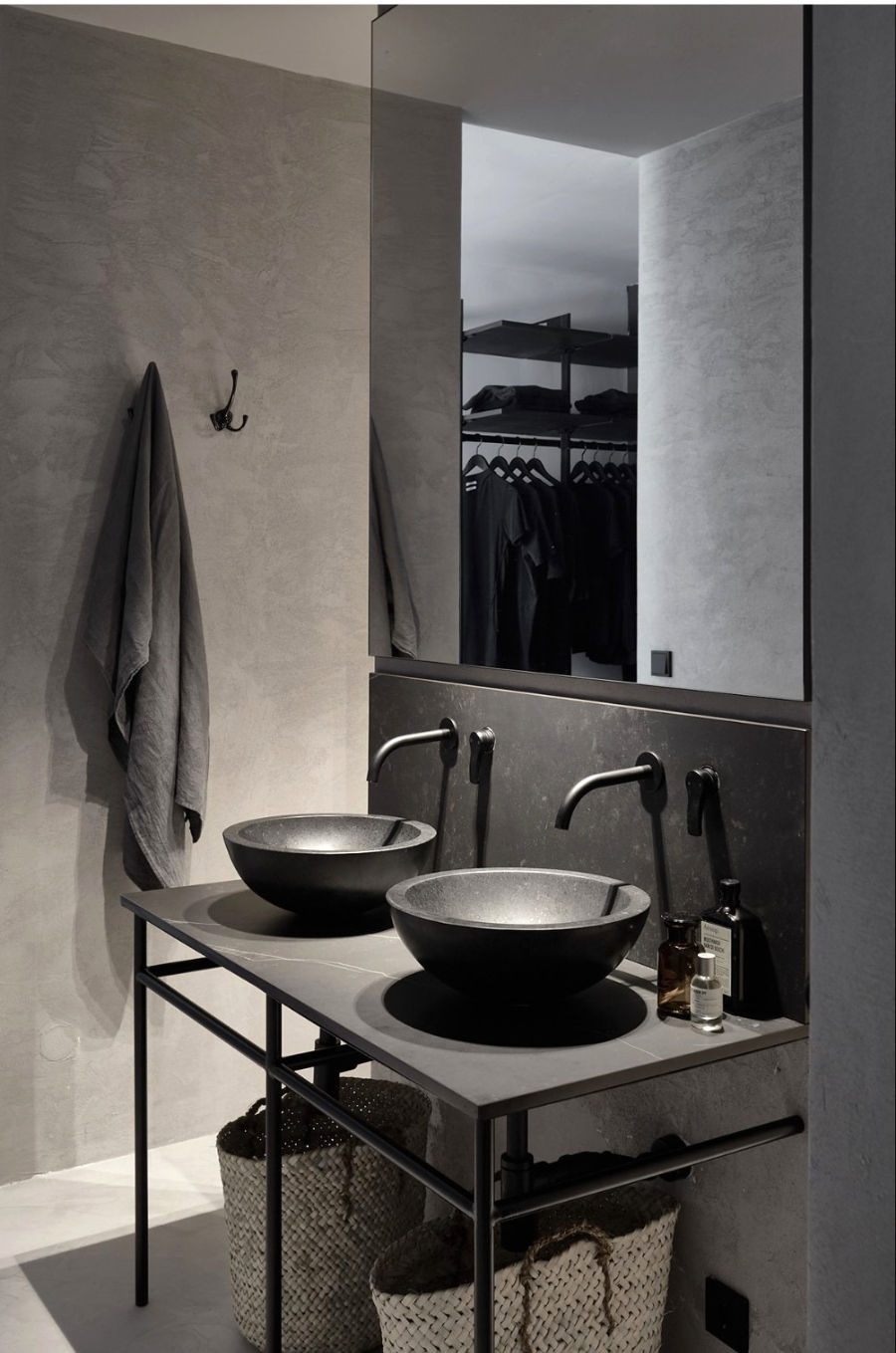 Desert Southwest custom designed vacation home interior in tonal shades of grey plaster and bronze accessories.