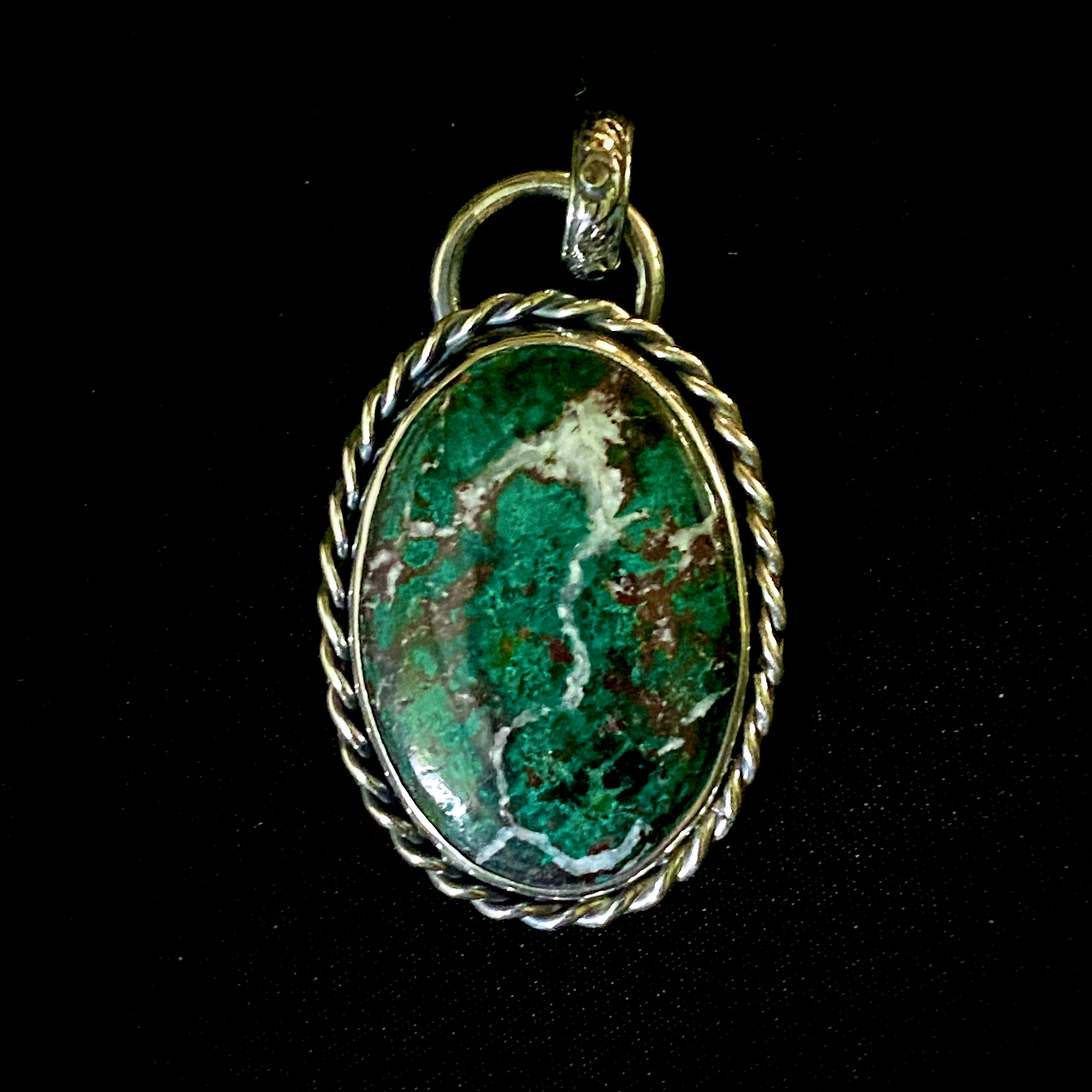 Sterling Silver Pendant with a green Chrysacolla cabochon.