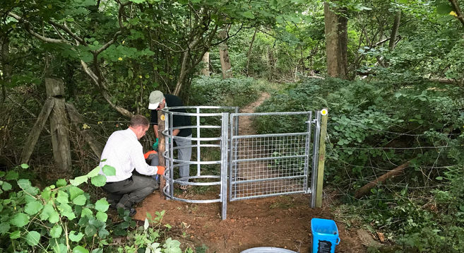 Kissing gate being installed in Bedwyn Brail