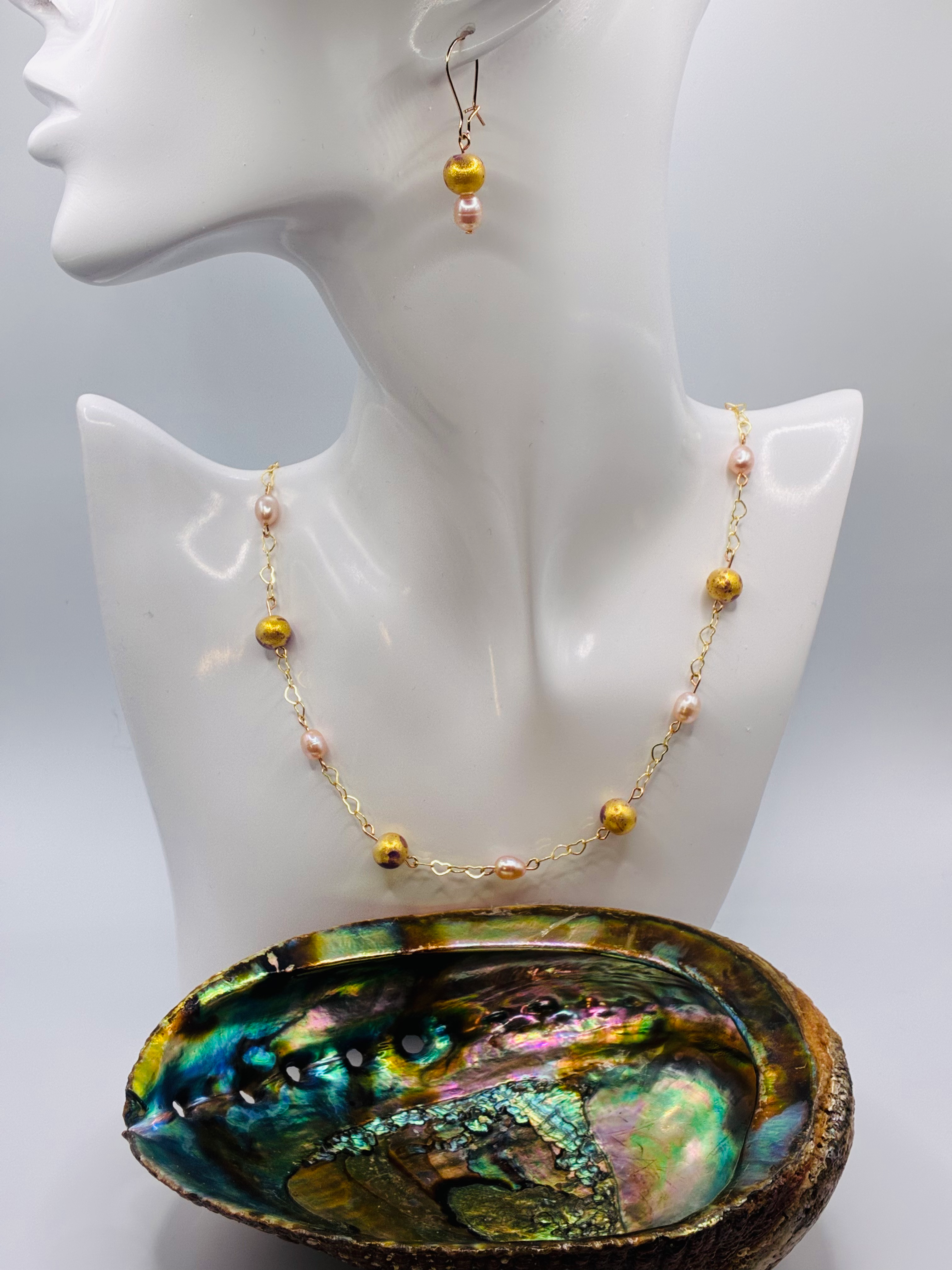 Elegant pearl and dusted gold beads embedded in heart chain, matching earrrings