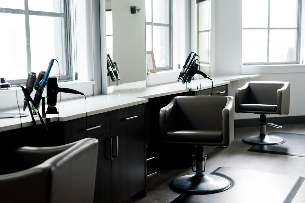 Modern beauty salon interior with styling stations
