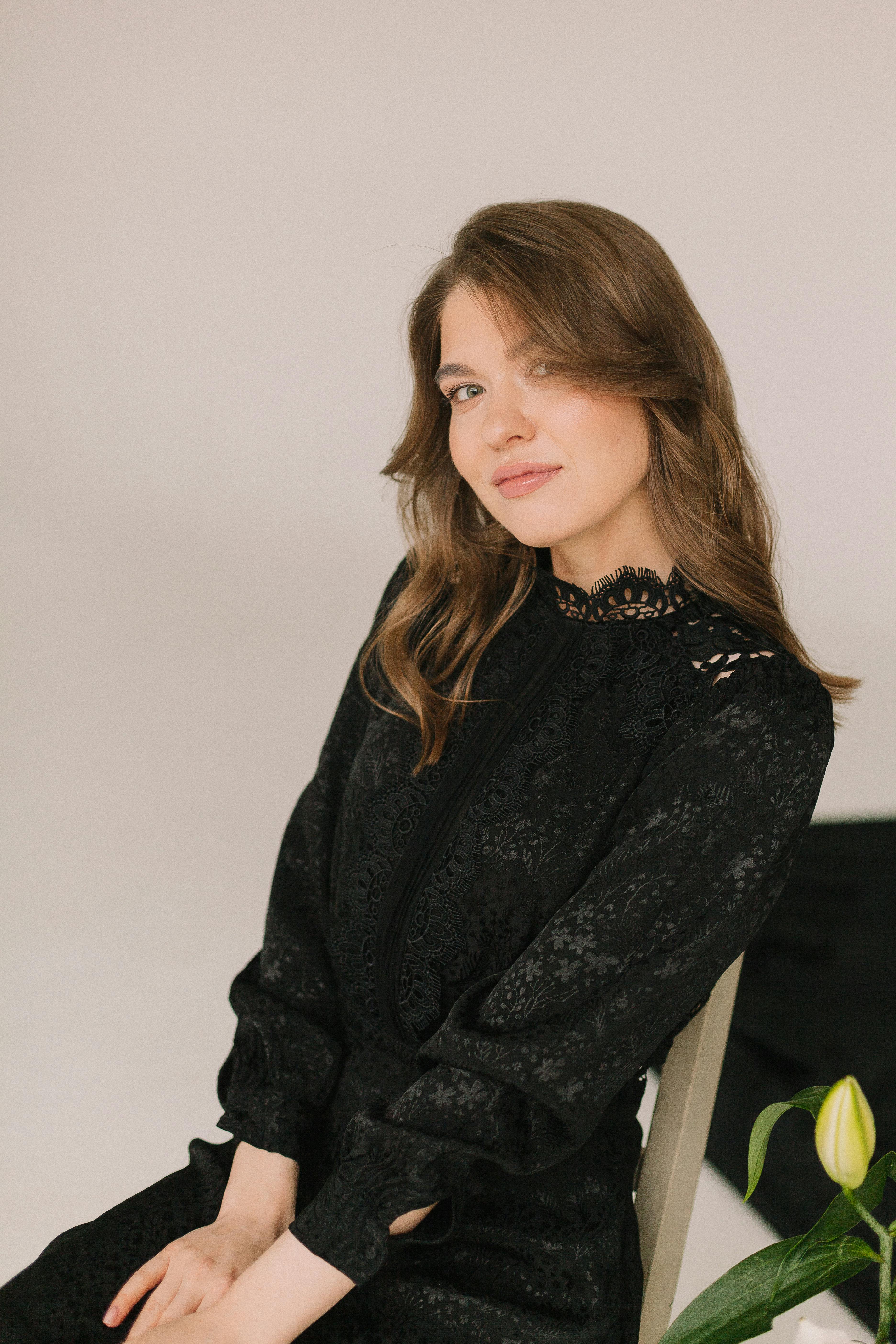 Woman in black lace blouse