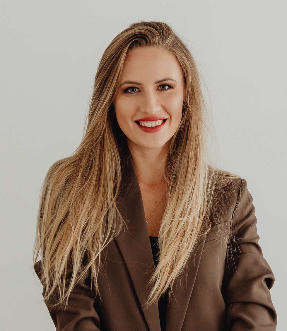 Smiling woman holding laptop, professional portrait