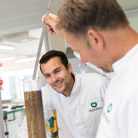 Incotec seed technology specialists working with treated seeds