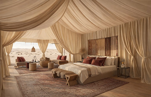 campamento de lujo con cama desierto marruecos