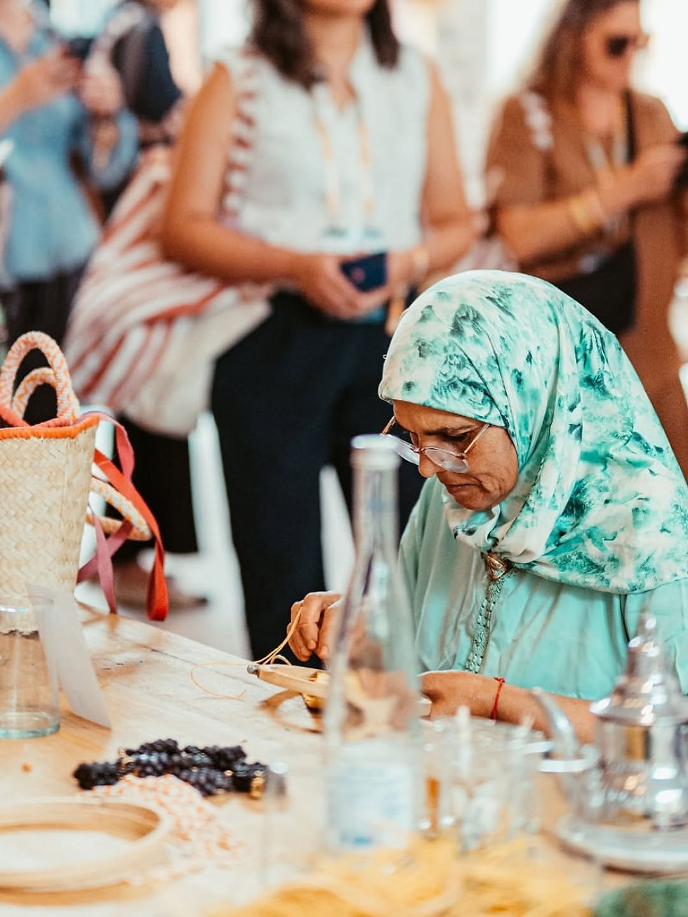 Artisan working by hand inside the women-run YZA atelier in Guéliz, Marrakech