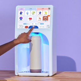 Bevi Signature Countertop machine dispensing a customized beverage, official Bevi press image