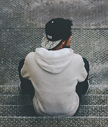 Person Sitting Outdoors
