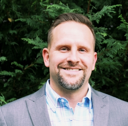 Head-and-shoulders professional portrait of Zach Swanson