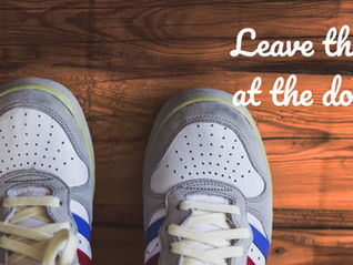 trainers on a wooden floor