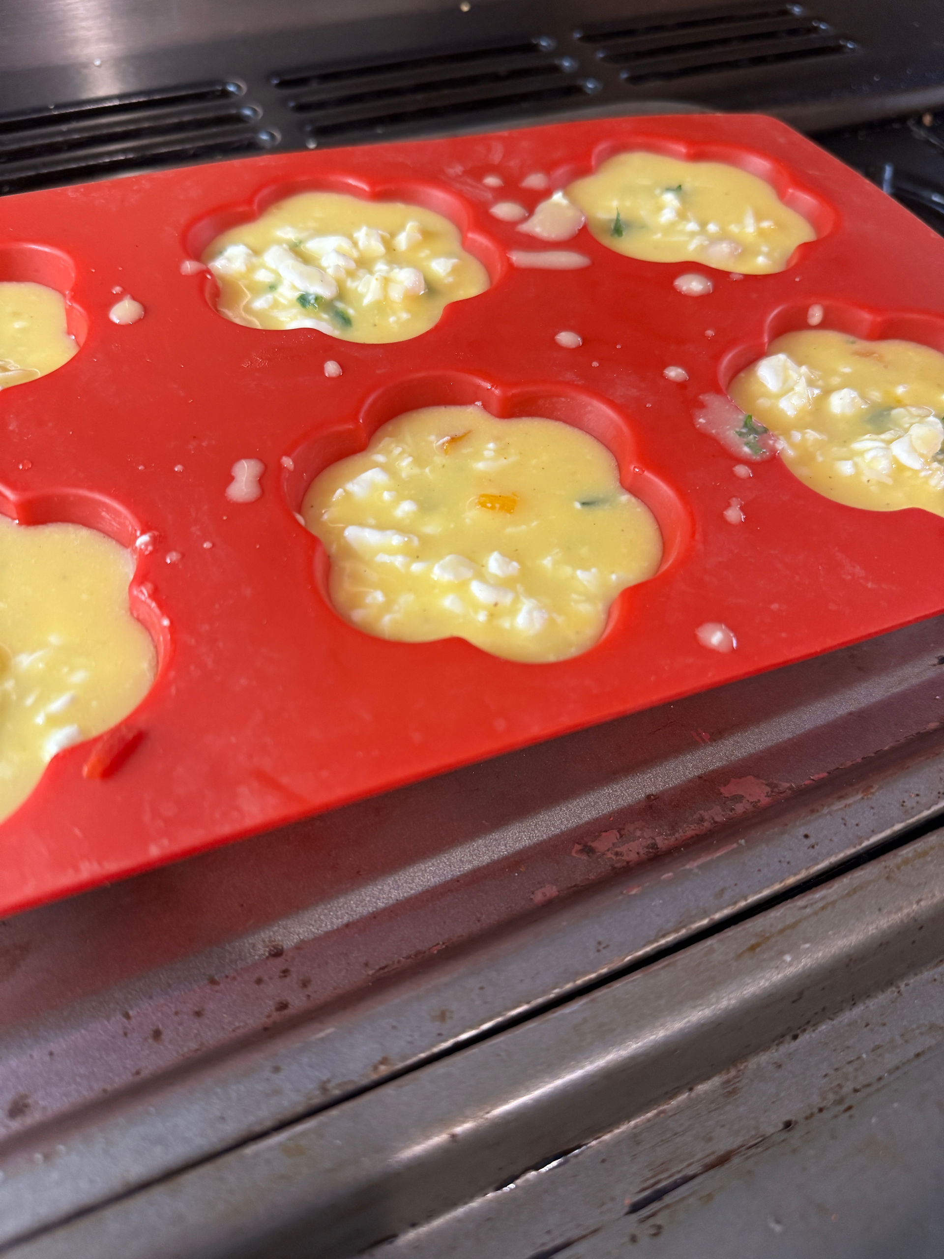 Egg mix in red silicon tray