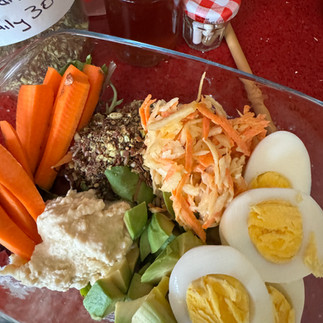 egg, carrot, coleslaw salad with seed mix