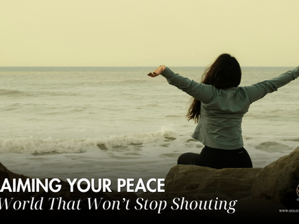 Woman with outstretched arms sits on rocks by the ocean, creating a peaceful mood. Text: "Reclaiming Your Peace in a World That Won't Stop Shouting."