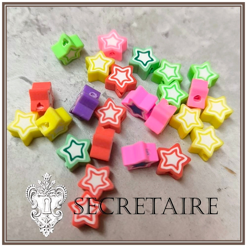 Soft polymer star beads, assorted. 25pc