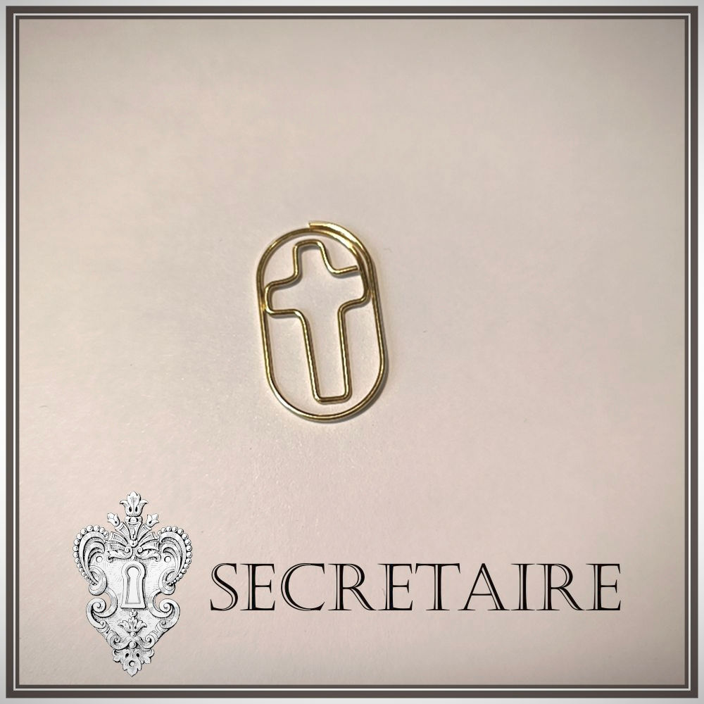 Cross paperclip, in circle [R10]