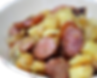 Poêlée de pomme de terre aux saucisses fumées