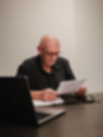 Murray reviewing a document