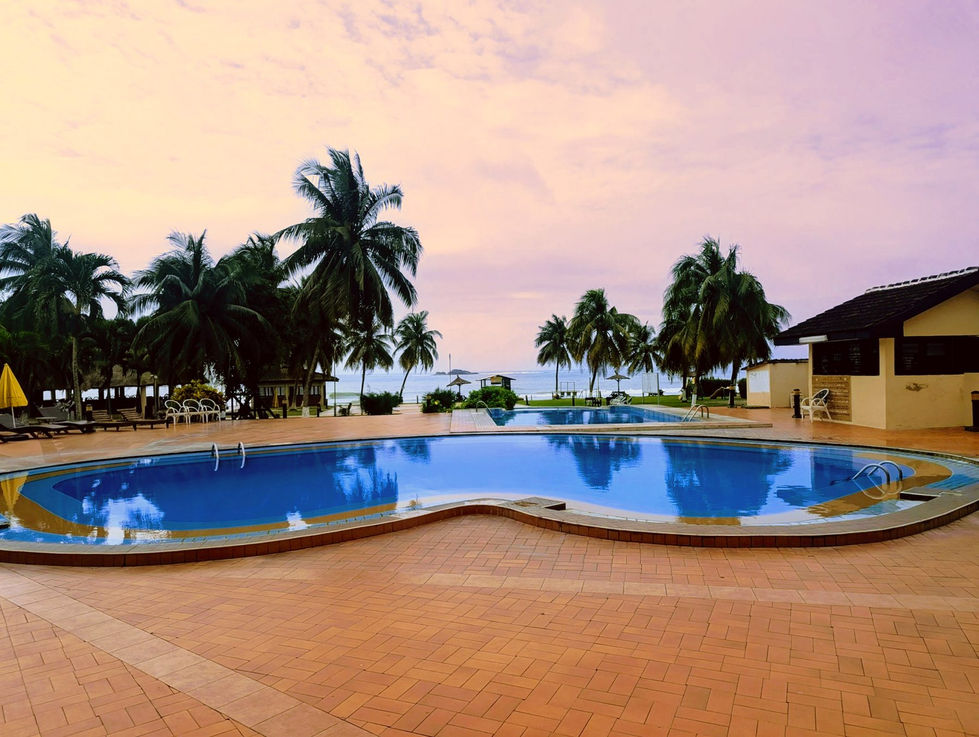 Beach resort pool overlooking the coast at Busua, Ghana