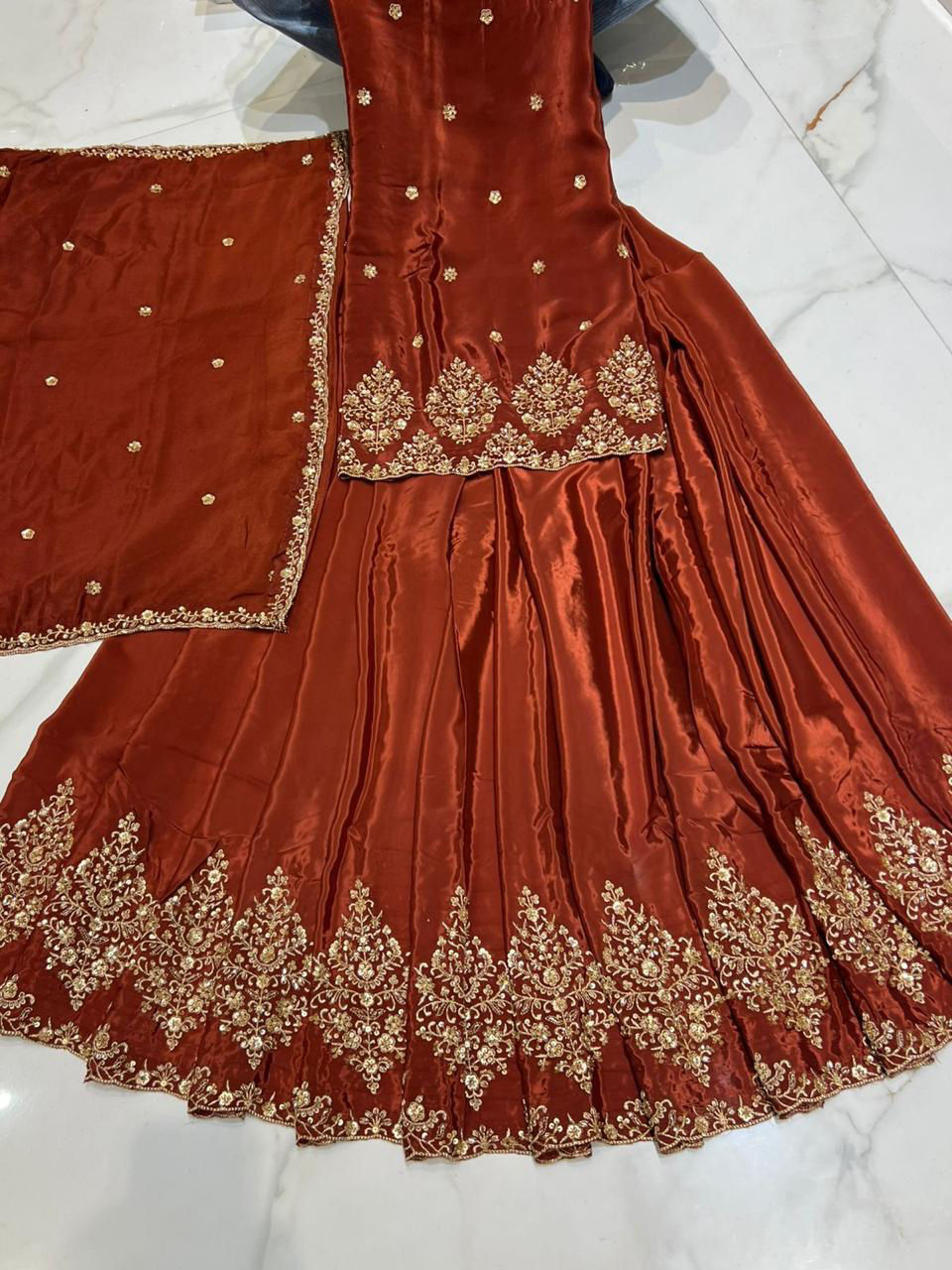 Thumbnail: Partywear handwork suit in rust colour fully stitched 