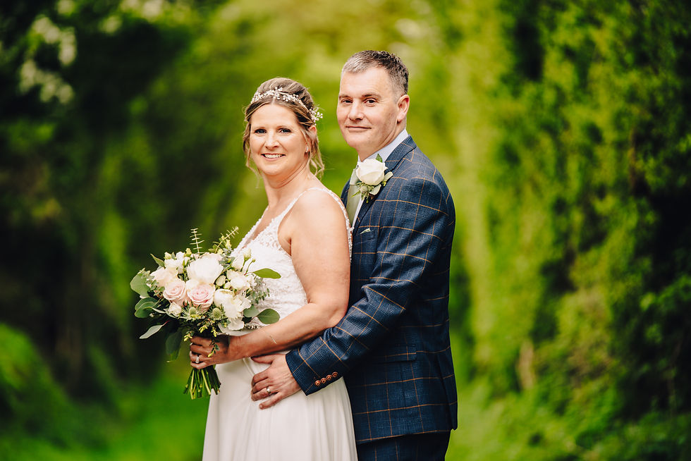 bride and groom posing for photos