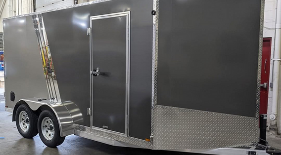 Two-tone enclosed tandem axle cargo trailer