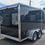 Thumbnail: Rear ramp door of black enclosed cargo trailer