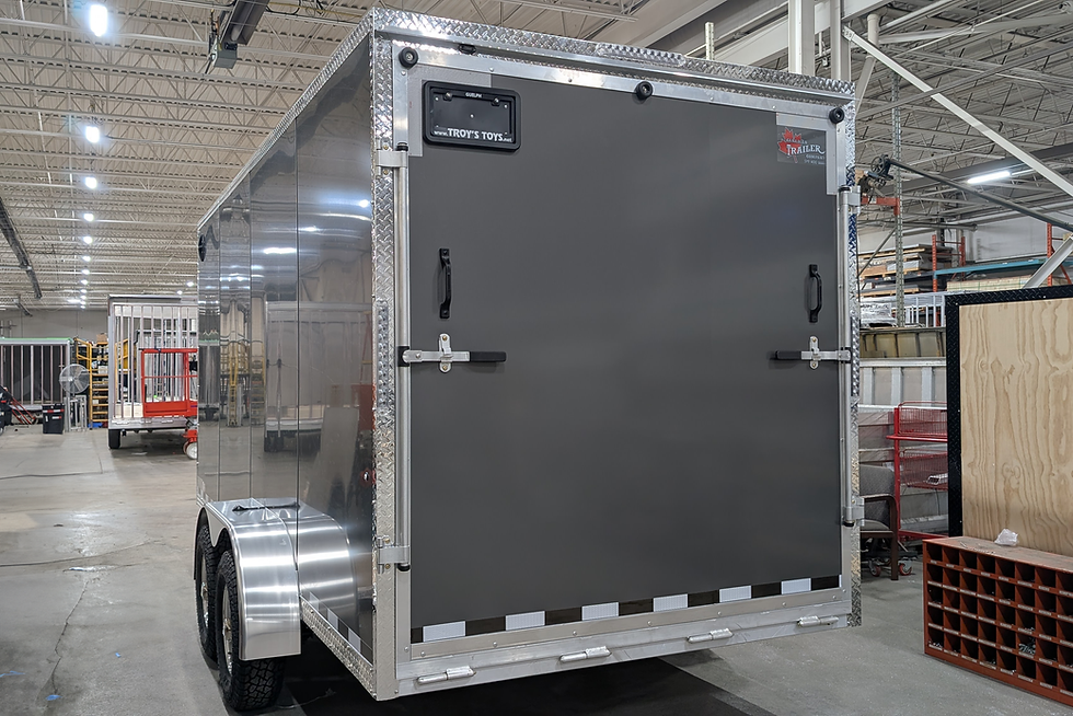 Thumbnail: Rear view of charcoal 7x16 cargo trailer
