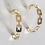 Thumbnail: Link Hoop Earrings, a stylish earring from Ear Goddess.