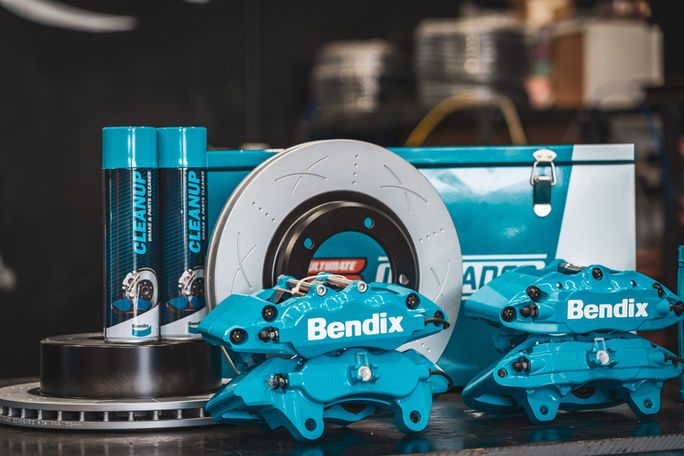 Bendix big brake upgrade kit parts displayed neatly in workshop