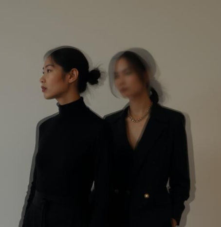 _high quality editorial photo image of two woman first korean second afro black. first wea