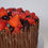 Thumbnail: Jewelled Fruit and Cigarellos Cake